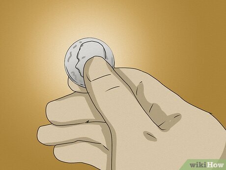 Шаг 2 Зарядите монеты своим намерением и добавьте их в чашу.